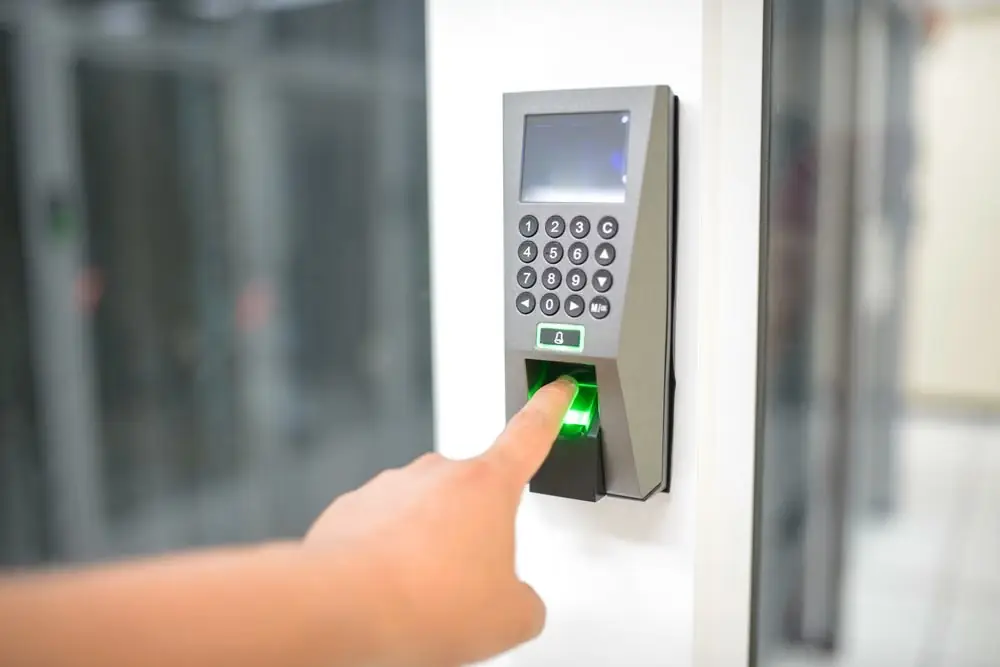 Fingerprint access control terminal on an office door